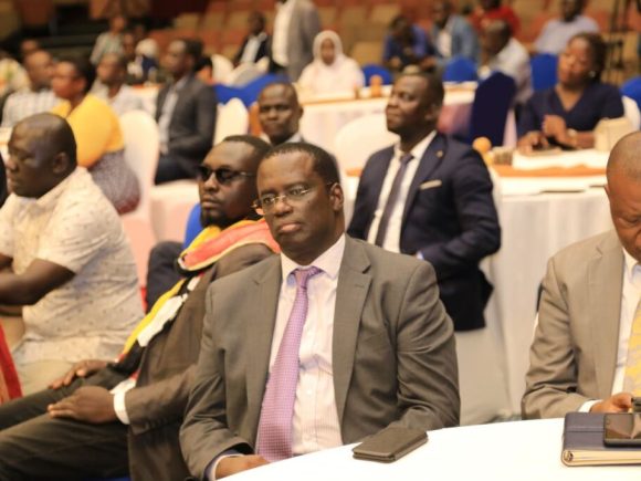 A cross-section of members of the royal family (above and below) listening to the lecture.