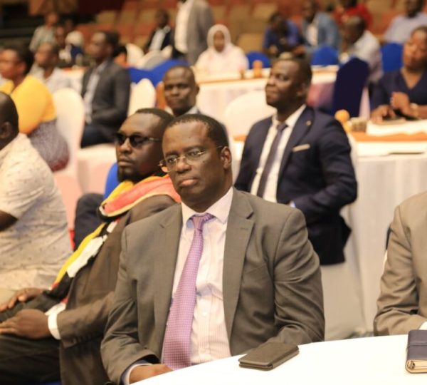 A cross-section of members of the royal family (above and below) listening to the lecture.